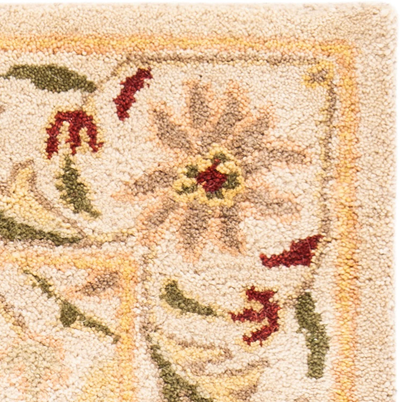 Safavieh Antiquity Collection AT14C Handmade Traditional Oriental Premium Wool Runner, 2'3" x 8' , Rust