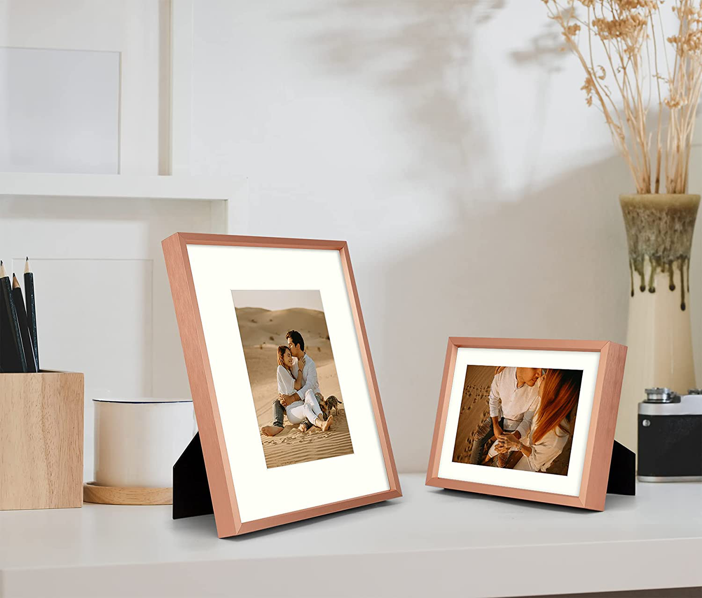 Frametory, Aluminum Picture Frames Set of 7 - Rose Gold Gallery Wall Kit - Displays One 11x14, Two 8x10, and Four 5x7 inch Photos for Home Decoration