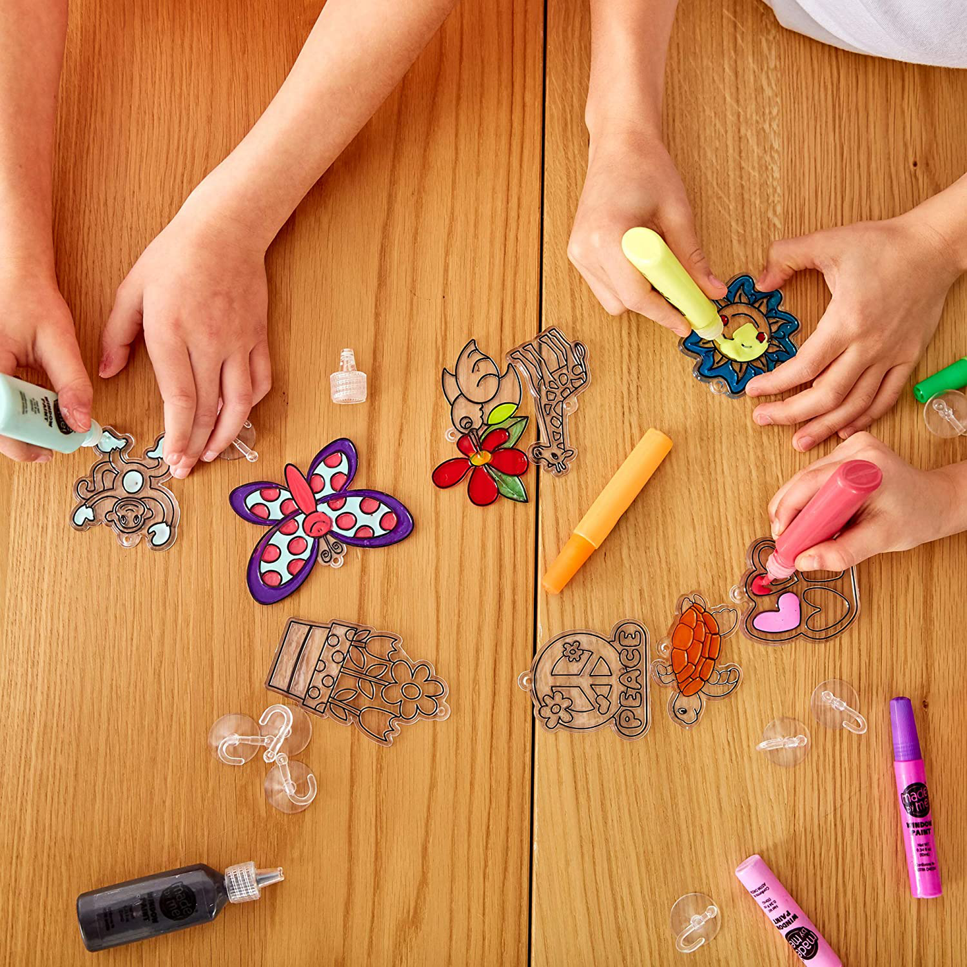 Made By Me Create Your Own Window Art by Horizon Group USA, Paint Your Own Suncatchers. Kit Includes 12 Pre-Printed Suncatchers, DIY Acetate Sheet, Window Paint, Suction Cups and More, Assorted Colors