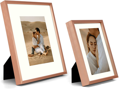 Frametory, Aluminum Picture Frames Set of 7 - Rose Gold Gallery Wall Kit - Displays One 11x14, Two 8x10, and Four 5x7 inch Photos for Home Decoration