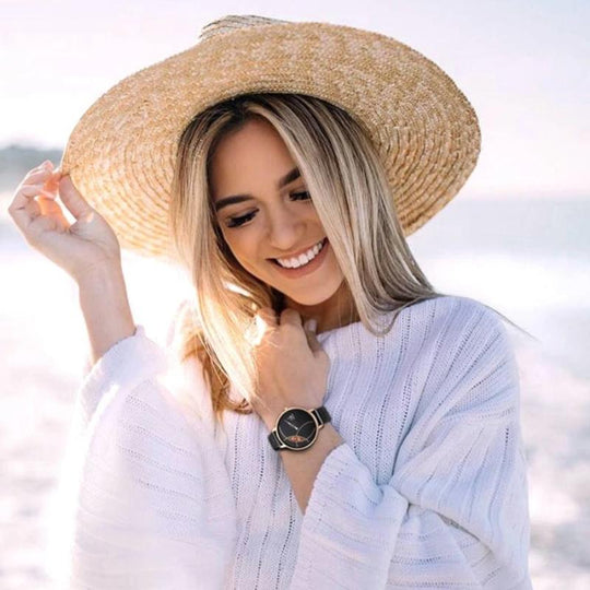 lady wearing black watch