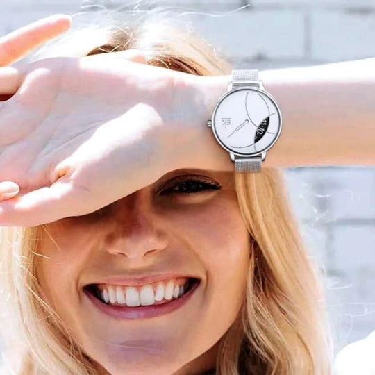 lady wearing silver watch